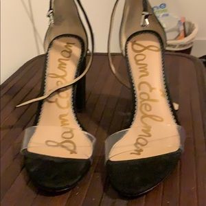 Black heels with front clear strap